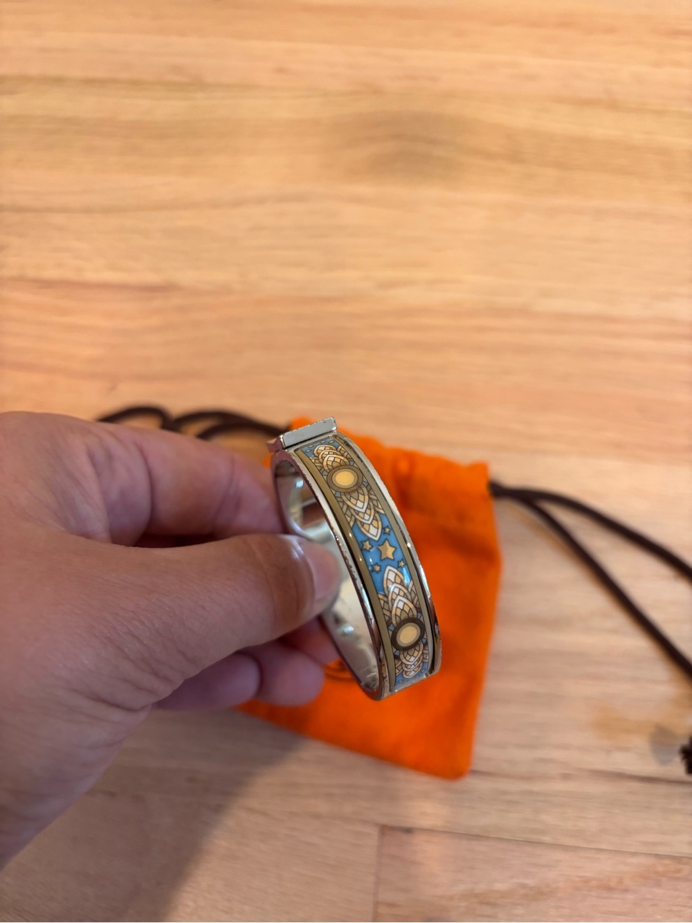 Hermès "Sun Moon Stars" enamel hinged bangle bracelet Preowned